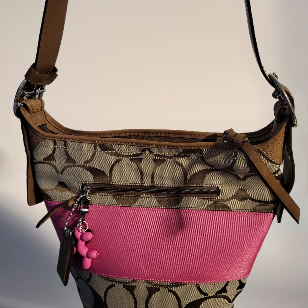 Coach Rugby Stripe Signature Duffle Bag.